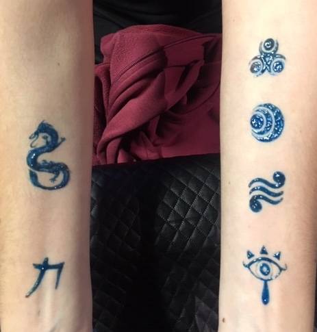 tatouage zelda dragon et symbole chinois bordeaux