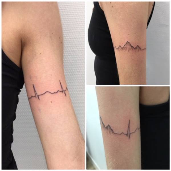 tatouage  bracelet femme bras electrocardiogramme et montagne libourne